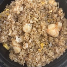 Refried rice after I had already eaten out of it and asked them to remake. Refried rice after I had already eaten out of it and asked them to remake.