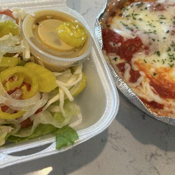 Cap's Pizza - Stuffed shell dinner comes with a beautiful salad and rolls. - Pizza Near Me - Vero Beach, Florida Cap's Pizza - Stuffed shell dinner comes with a beautiful salad and rolls. - Pizza Near Me - Vero Beach, Florida