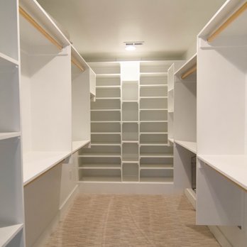 Tobin Construction - a walk - in closet with built in shelvings - General Contractors Near Me - Raleigh, North Carolina Tobin Construction - a walk - in closet with built in shelvings - General Contractors Near Me - Raleigh, North Carolina