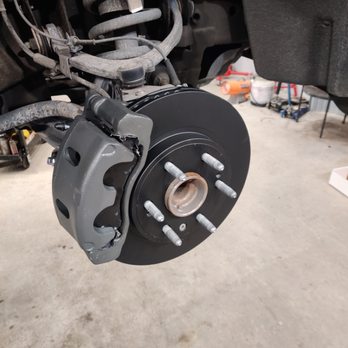 Freedom Auto Repair - Complete front brake job. Our premium brake rotors carry an industry leading 3 year warranty. - Auto Repair Near Me - Willis, Texas