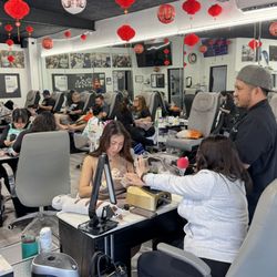 BeautyBar SGV - King holding a mic for Jen on Karaoke Day at BeautyBar SGV