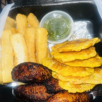 Secretos De Mis Abuelos - Frybox contains Fried platanos, yuca fritas, and tostones with choice of sauce. - Puerto Rican Near Me - Homestead, Pennsylvania Secretos De Mis Abuelos - Frybox contains Fried platanos, yuca fritas, and tostones with choice of sauce. - Puerto Rican Near Me - Homestead, Pennsylvania