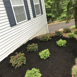 All American Land and Lawn Care - Here is an in progress planting and mulching job. No job is ever too small