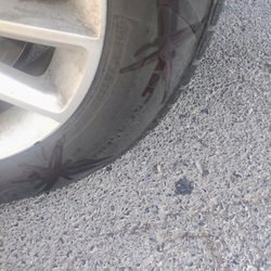 Meineke Car Care Center - The 2 marks I put on my tire  after they rotated them but they didn't rotate them because the tire was in the same spot