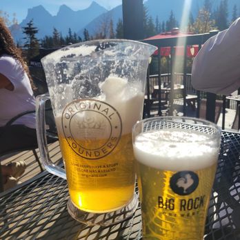 The Drake Pub - two glasses of beer on a table - Pubs Near Me - Canmore, Alberta