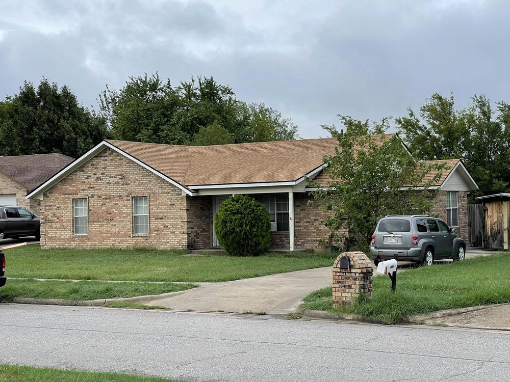 Slide of Solotzo Roofing