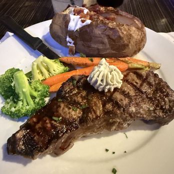 Luke's On Front - New York Strip steak with baked potato and veggies - New American Near Me - Temecula, California