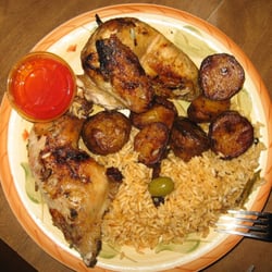 Churrasco Villa - Half chicken with rice, potatoes and piri-piri sauce.
