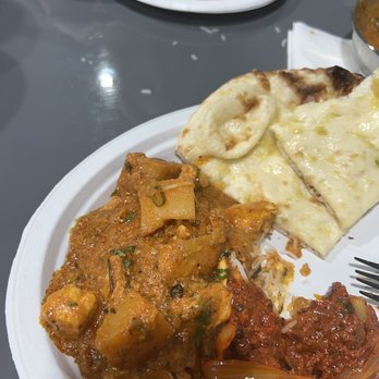 Bob’s Indian Kitchen - Chicken Vindaloo. Spicy, but has some potatoes to balance it. Of course if we got the garlic naan as well. - Indian Near Me - Brownsburg, Indiana Bob’s Indian Kitchen - Chicken Vindaloo. Spicy, but has some potatoes to balance it. Of course if we got the garlic naan as well. - Indian Near Me - Brownsburg, Indiana