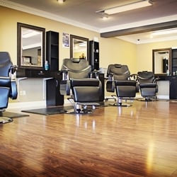Razors & Shears - Updated barber shop with rich colors and comfortable setting
