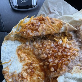 Taco Bell - The cheese is at the top of the picture, with a smaller amount to the lower left. You could literally count the shreds, there are so few. - Fast Food Near Me - Lincoln, Nebraska Taco Bell - The cheese is at the top of the picture, with a smaller amount to the lower left. You could literally count the shreds, there are so few. - Fast Food Near Me - Lincoln, Nebraska