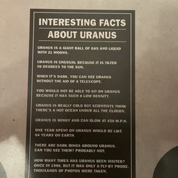 On one of the tiles underneath where you sit in the toilet for the women's bathroom On one of the tiles underneath where you sit in the toilet for the women's bathroom
