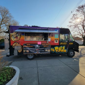 Dump-N-Roll - ows a food truck parked in a parking lot - Food Trucks Near Me
