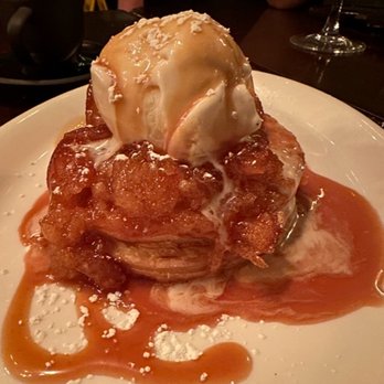 The Milling Room - Apple Tarte Tatin with
Baileys ice cream, caramel sauce - New American Near Me - New York, New York The Milling Room - Apple Tarte Tatin with
Baileys ice cream, caramel sauce - New American Near Me - New York, New York