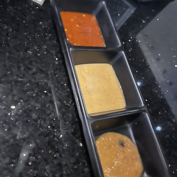 Stone Age Korean BBQ - Three sauces: Chili Yum yum Soy bean paste - Korean Near Me - Huntsville, Alabama Stone Age Korean BBQ - Three sauces: Chili Yum yum Soy bean paste - Korean Near Me - Huntsville, Alabama