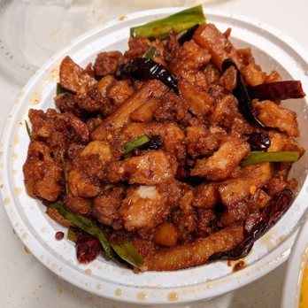 Grand Sichuan - a plate of chicken and vegetables - Szechuan Near Me - Jersey City, New Jersey Grand Sichuan - a plate of chicken and vegetables - Szechuan Near Me - Jersey City, New Jersey