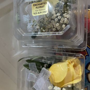 Enchanted Florist & Gifts - The Safeway made boutineere has the yellow flower. You can see the difference right here in the flower choice. - Florists Near Me - San Ramon, California Enchanted Florist & Gifts - The Safeway made boutineere has the yellow flower. You can see the difference right here in the flower choice. - Florists Near Me - San Ramon, California