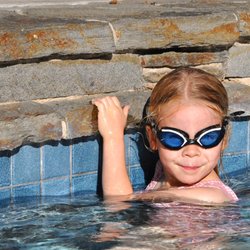 My Little Swimmer - With determination and a growing understanding for safety, this little swimmer, paddle her body over to the reassuring edge.