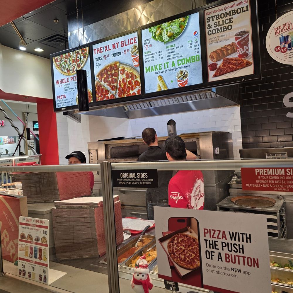 Sbarro - The counter with the lit menu above. - Pizza Near Me - ROANOKE, Virginia Sbarro - The counter with the lit menu above. - Pizza Near Me - ROANOKE, Virginia