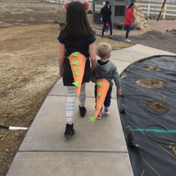 Arvada Pediatric Associates North - Children wearing dinosaur tales!