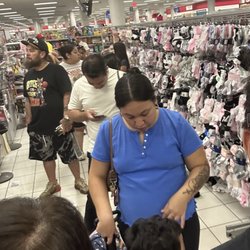 Horrible wait!! 2 cashiers - 3rd person walking around!!