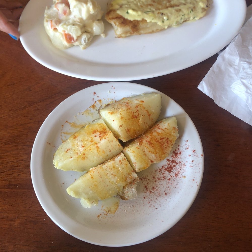 La Taberna De San Roman - Potatoes and fish filet - Spanish Near Me - Doral, Florida La Taberna De San Roman - Potatoes and fish filet - Spanish Near Me - Doral, Florida