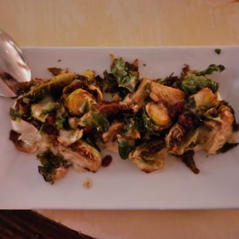 Zaytinya - Crispy Brussels Afelia: Brussels sprouts, coriander seed, barberries, garlic yogurt ($9) - Greek Near Me - Washington, DC, District of Columbia Zaytinya - Crispy Brussels Afelia: Brussels sprouts, coriander seed, barberries, garlic yogurt ($9) - Greek Near Me - Washington, DC, District of Columbia