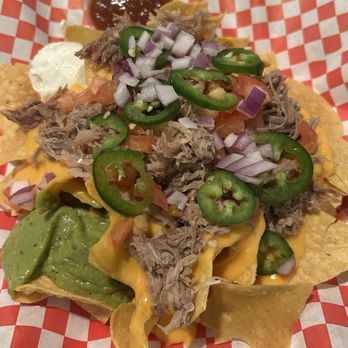 Stinger Ray's Tropical Bar & Grill - Kahlua pork nachos - Bars Near Me - Honolulu, Hawaii Stinger Ray's Tropical Bar & Grill - Kahlua pork nachos - Bars Near Me - Honolulu, Hawaii