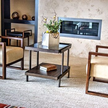 Builders Design Group - Home lounge carpeted flooring and tiled fireplace - Flooring Near Me - Las Vegas, Nevada