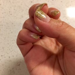 Should've been a white fade with glitter gel mani - didn't last a week. Most gel mani's I get last at least 3-4 weeks. Should've been a white fade with glitter gel mani - didn't last a week. Most gel mani's I get last at least 3-4 weeks.
