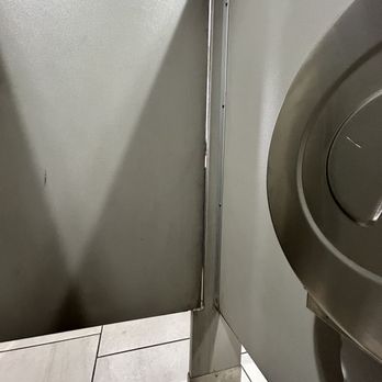 Target - Bathroom stall door, walls, corners looks to have never been cleaned. - Department Stores Near Me - Bozeman, Montana