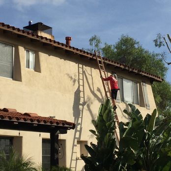 Sutton Roofing and Solar - Peter's son Tristin works on the roof covering the 2nd story. Over 80 tiles had to be replaced up there. - Roofing Near Me