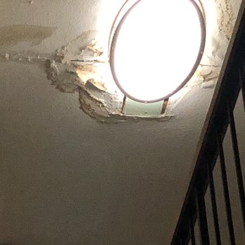 La Grande Inn - Water coming through the light fixture at the top of the stairs collecting in trash cans! - Hotels Near Me - La Grande, Oregon La Grande Inn - Water coming through the light fixture at the top of the stairs collecting in trash cans! - Hotels Near Me - La Grande, Oregon