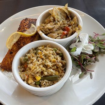 Noir Kitchen & Cocktails - Salmon, Cajun cabbage and dirty rice - Soul Food Near Me - Nashville, Tennessee Noir Kitchen & Cocktails - Salmon, Cajun cabbage and dirty rice - Soul Food Near Me - Nashville, Tennessee