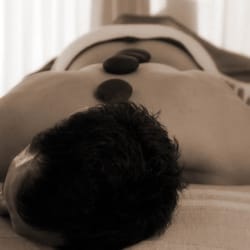 Body Restoration Mechanic - Hot stone massage for tension and aches.