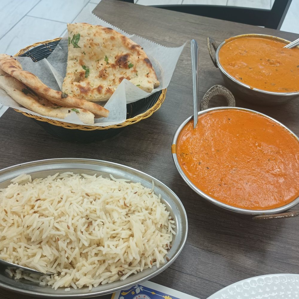 Naan N Oven - Garlic naan, butter chicken bottom, chicken tikka top with rice amazing - Indian Near Me - Salida, California Naan N Oven - Garlic naan, butter chicken bottom, chicken tikka top with rice amazing - Indian Near Me - Salida, California