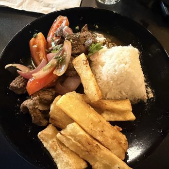 Cayjo Peruvian Cuisine - LOMO SALTADO with Yuca - Peruvian Near Me - Orlando, Florida Cayjo Peruvian Cuisine - LOMO SALTADO with Yuca - Peruvian Near Me - Orlando, Florida