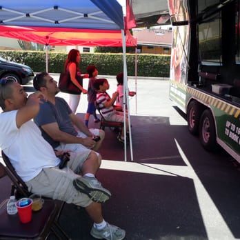 Stonez Rolling Video Games - Even the adults are gaming! - Game Truck Rental Near Me