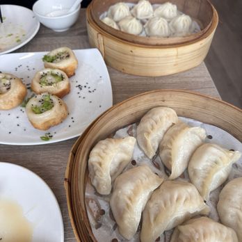 Dumpling Kitchen - Dumpling spread: Shanghai-Style Steamed Pork Dumplings, Shanghai-Style Pan-Fried Pork Buns, Steamed Pork & Napa Cabbage Dumplings - Chinese Near Me - San Francisco, California