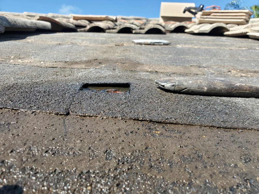 Slide of Rip Tide Roofing