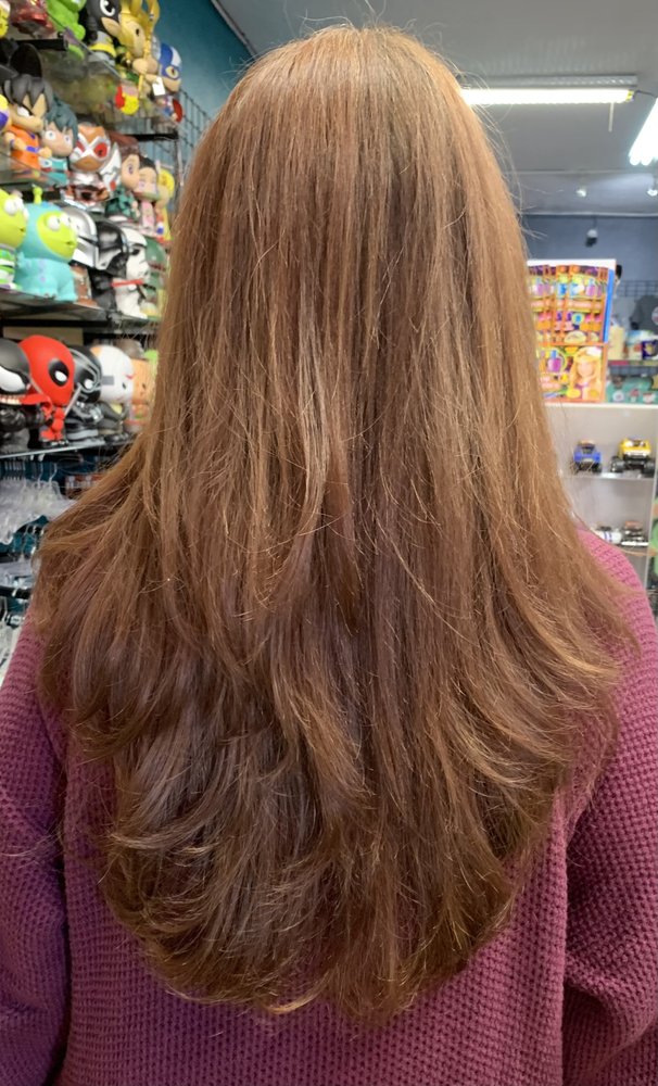 Hair by Krista Dodd Logo