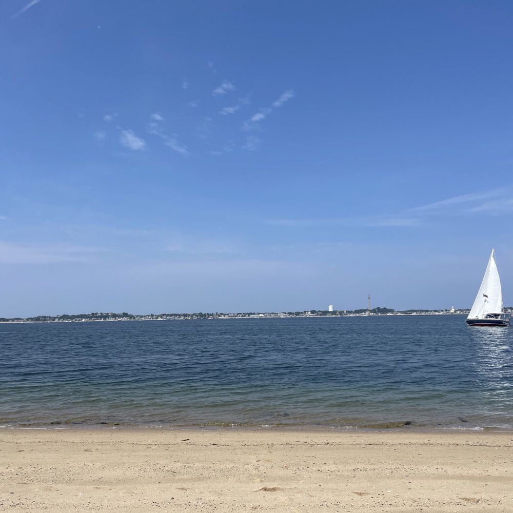 Provincetown Causeway - Nearly empty beach with a sailboat cruising by (near the long point lighthouse) - Hiking Near Me - Provincetown, Massachusetts Provincetown Causeway - Nearly empty beach with a sailboat cruising by (near the long point lighthouse) - Hiking Near Me - Provincetown, Massachusetts