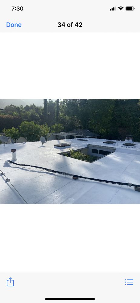 Slide of Michiel Roofing