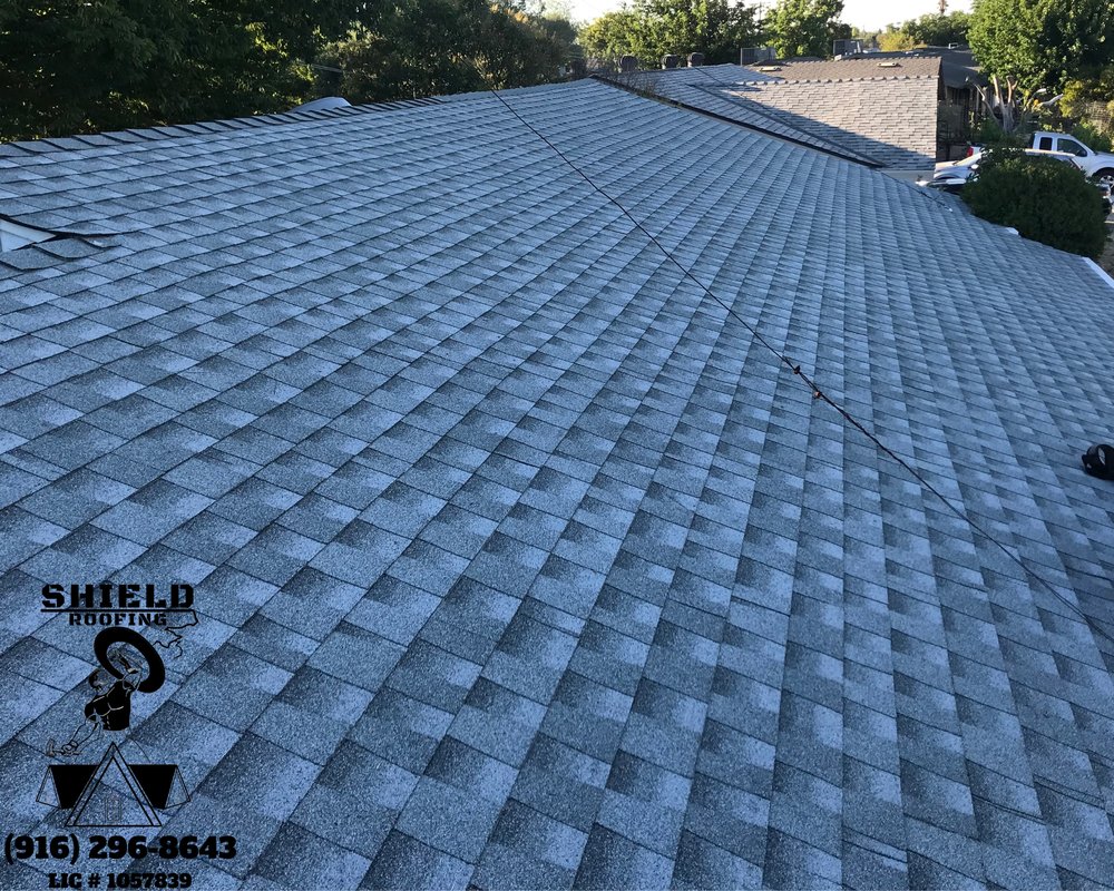 Slide of Shield Roofing