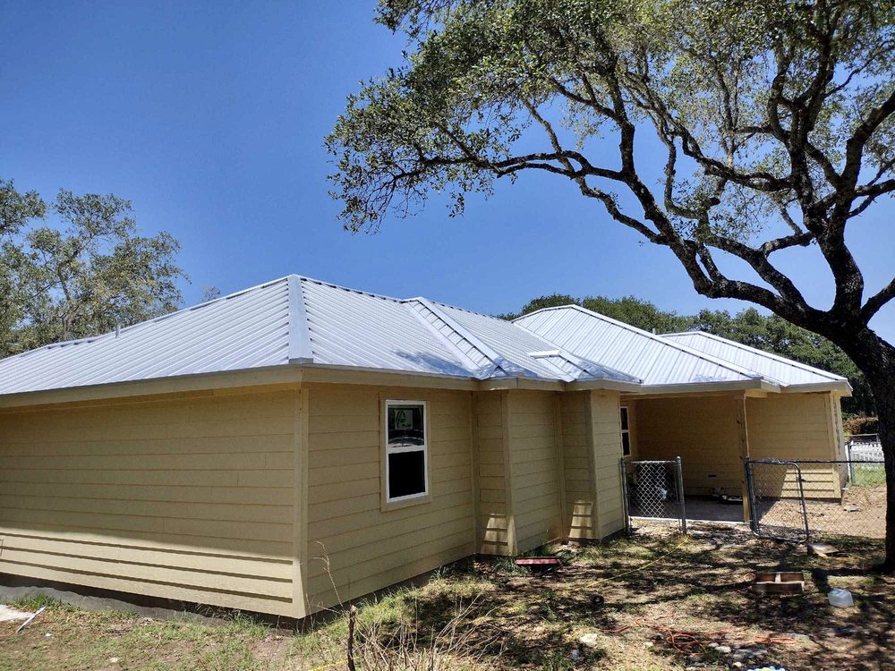 Slide of Wilson Roofing and Renovations