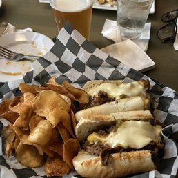 Cheesesteak and chips.