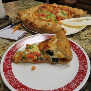 Papa Murphy's - a slice of pizza on a plate - Pizza Near Me - Round Rock, Texas Papa Murphy's - a slice of pizza on a plate - Pizza Near Me - Round Rock, Texas