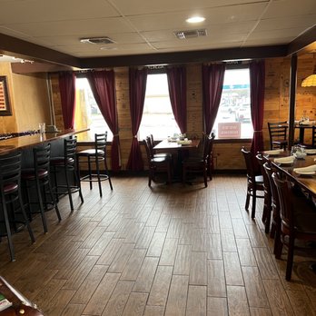 Bella Sera - a restaurant with wood floors and tables - Pizza Near Me - Boerne, Texas Bella Sera - a restaurant with wood floors and tables - Pizza Near Me - Boerne, Texas