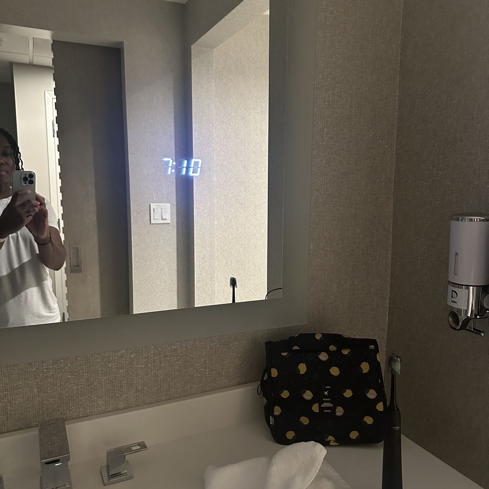 Clock in bathroom mirror is a nice touch when showering/ getting dressed and not having your phone or watch Clock in bathroom mirror is a nice touch when showering/ getting dressed and not having your phone or watch