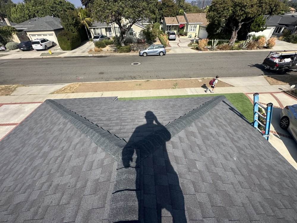 Slide of Rod's Roofing